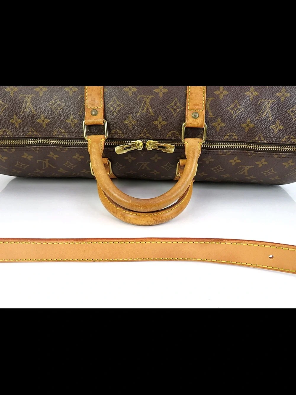 Louis Vuitton Brown Monogram Duffel with Tan Leather Strap